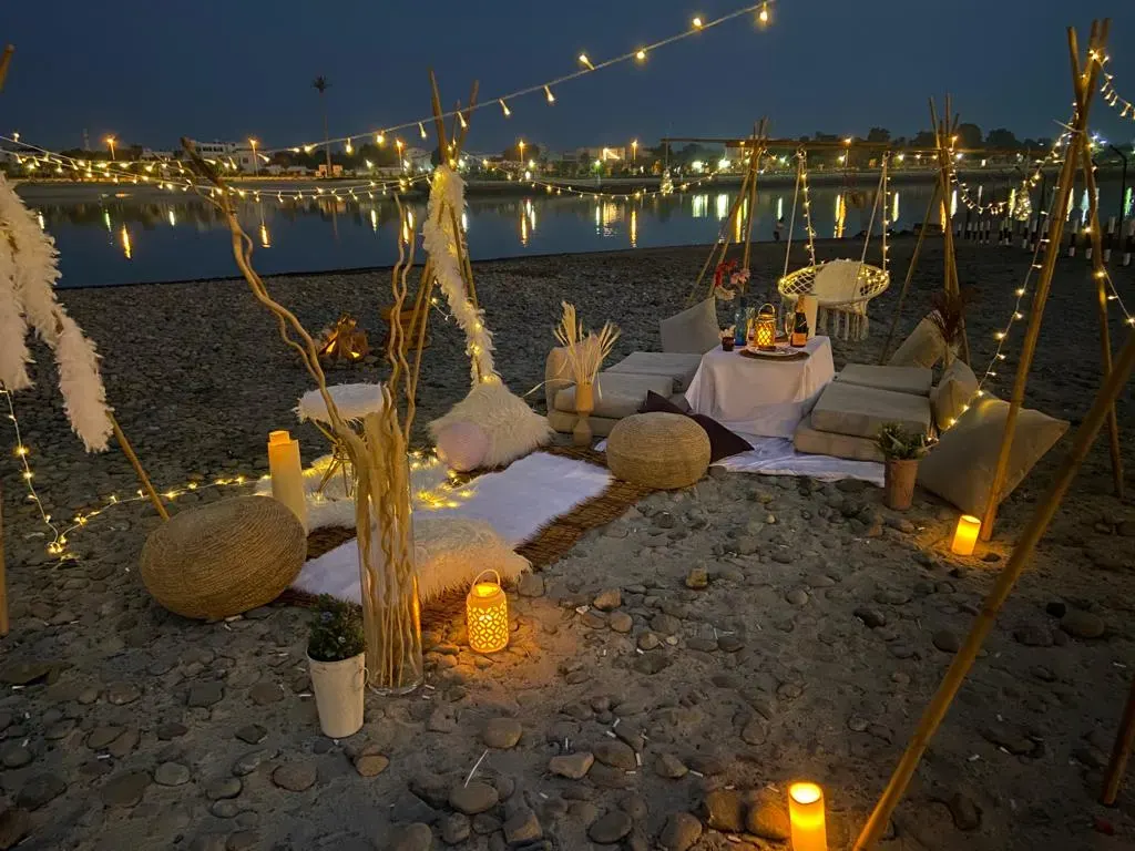 Beachfront Picnics — Lakeside teepees at golden hour