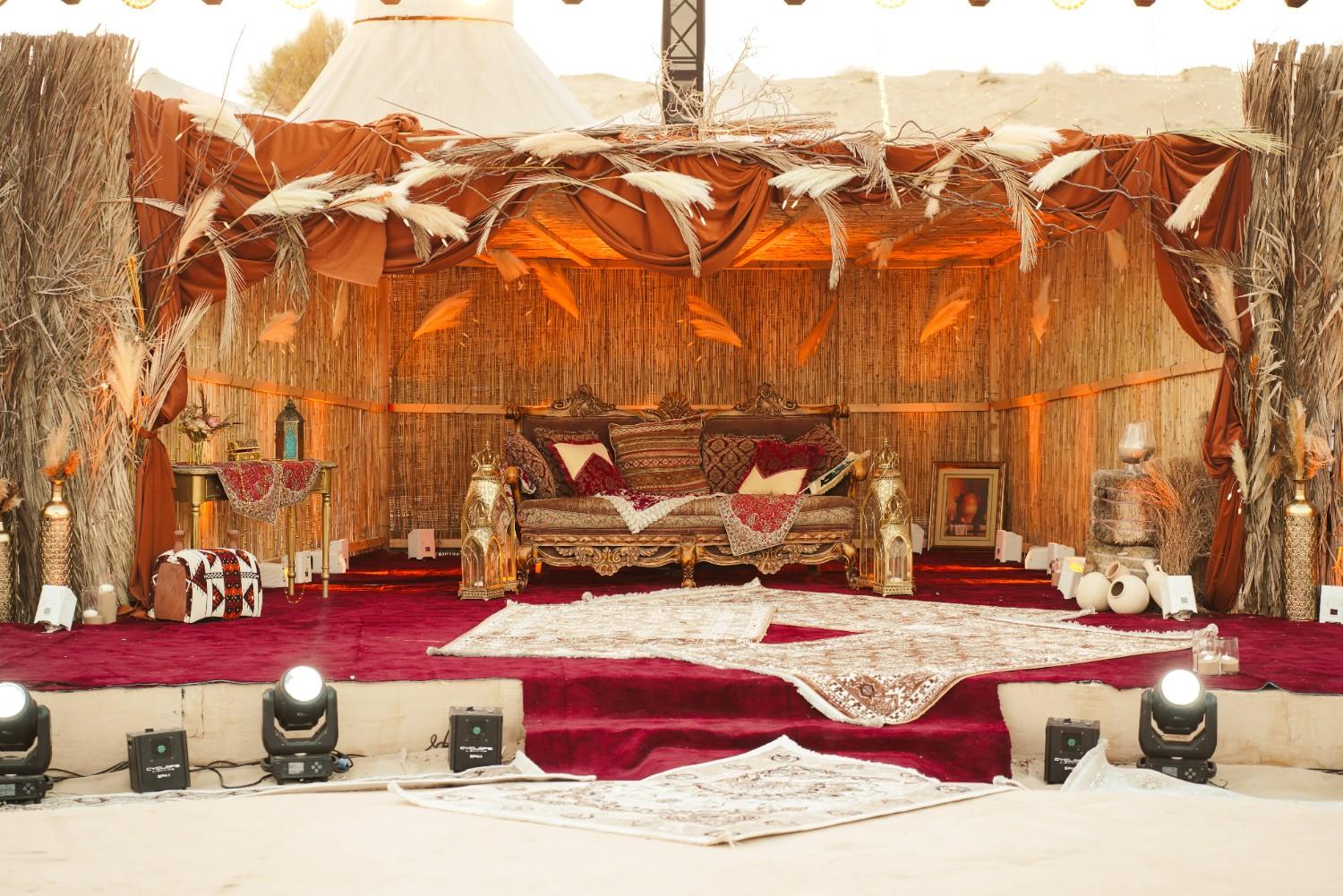 Mehendi mandap with pampas and copper drapes, January 2026 wedding