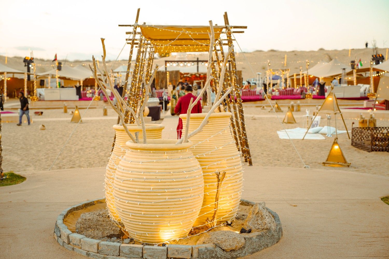 Illuminated clay urn entrance to the wedding ceremony