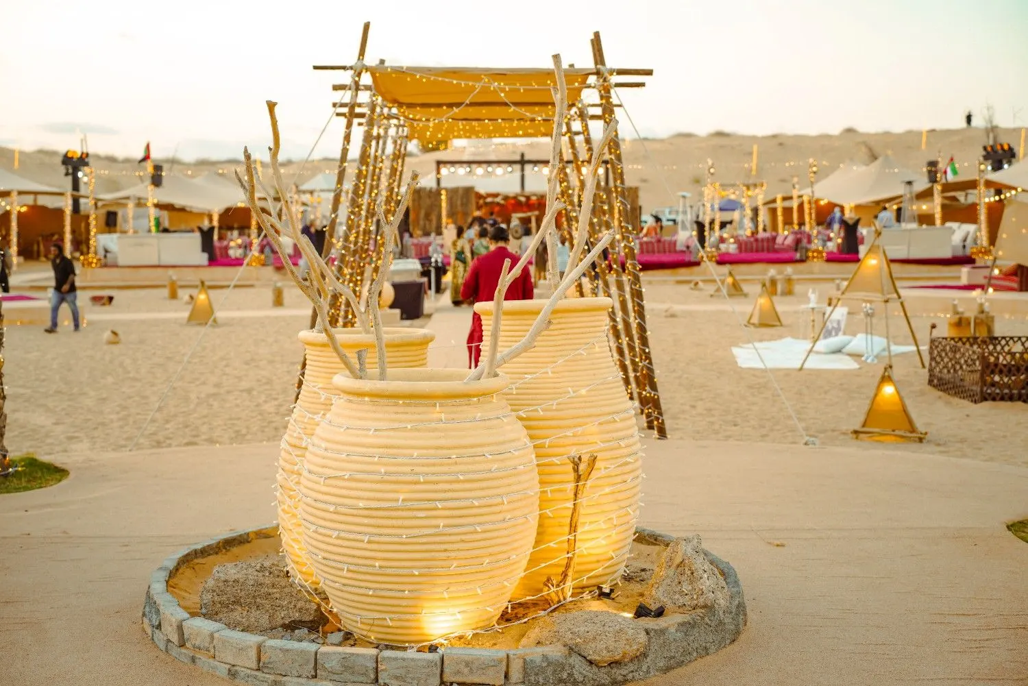 Illuminated clay urn entrance to the wedding ceremony