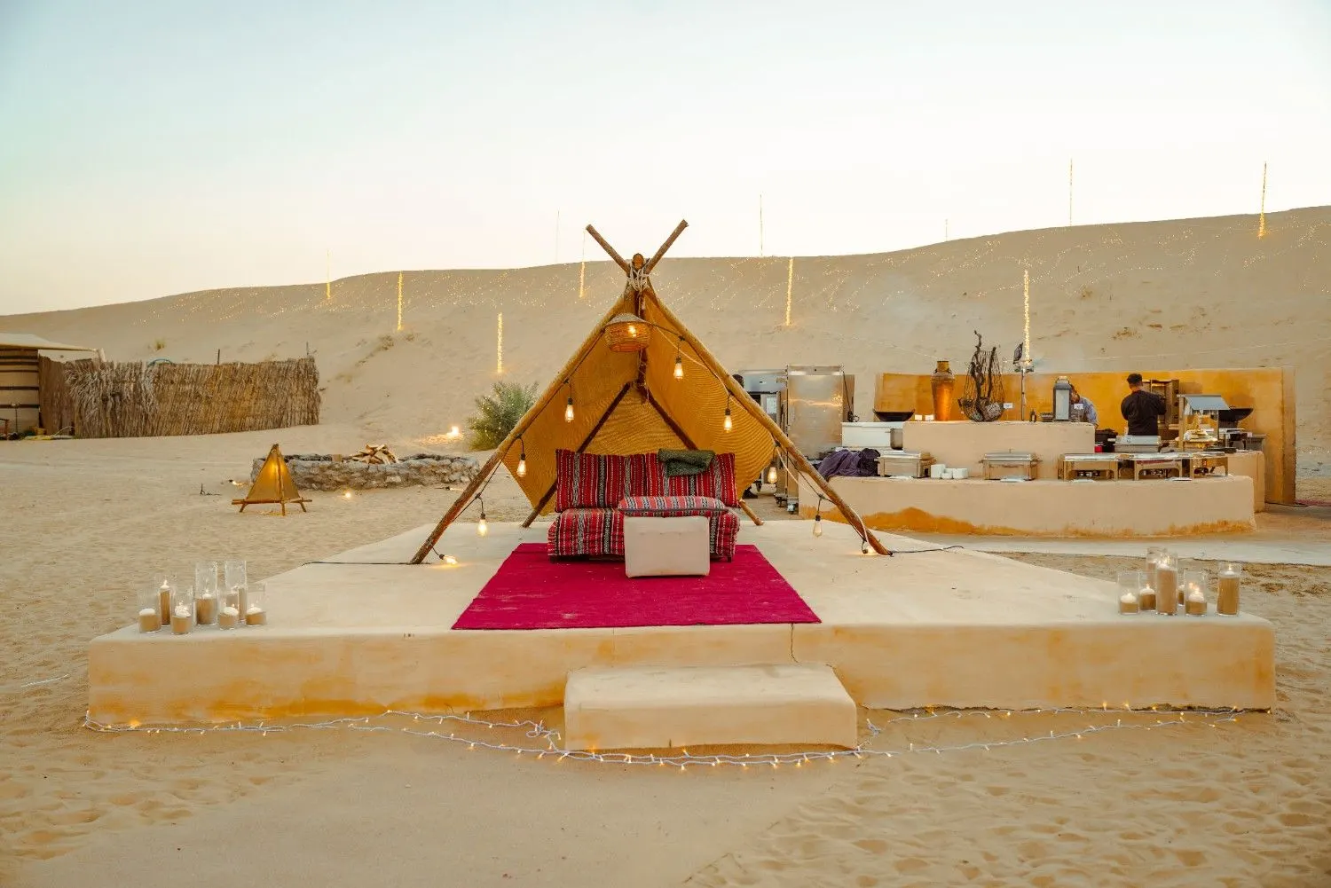 Private teepee lounge at the wedding's chef station
