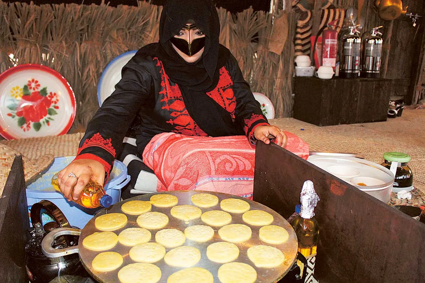 Emirati Live Stations — Chebab grilled to order by Emirati hostesses