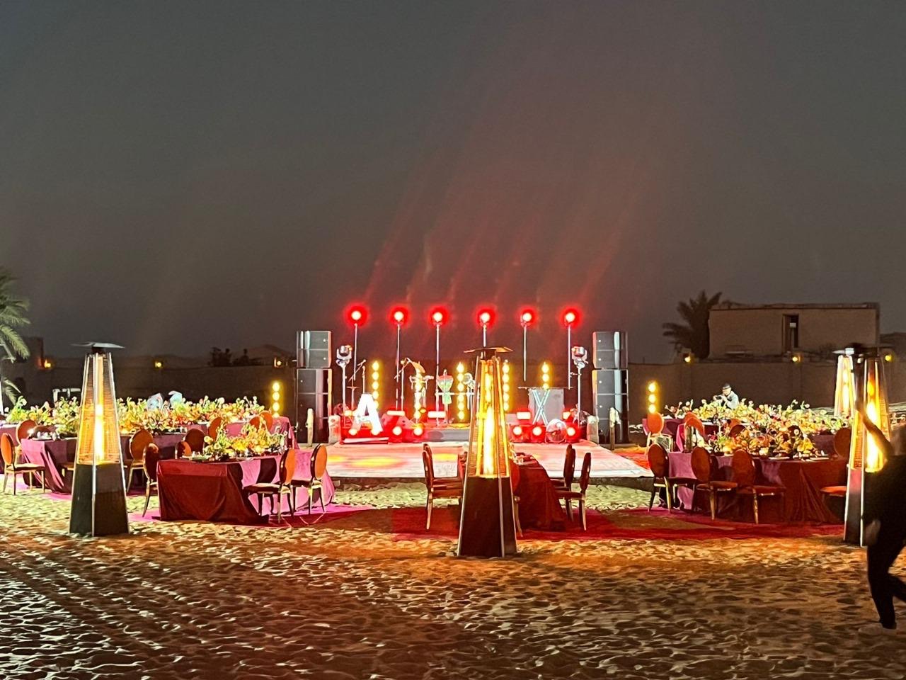Desert stage production for a UAE National Day corporate evening near Abu Dhabi
