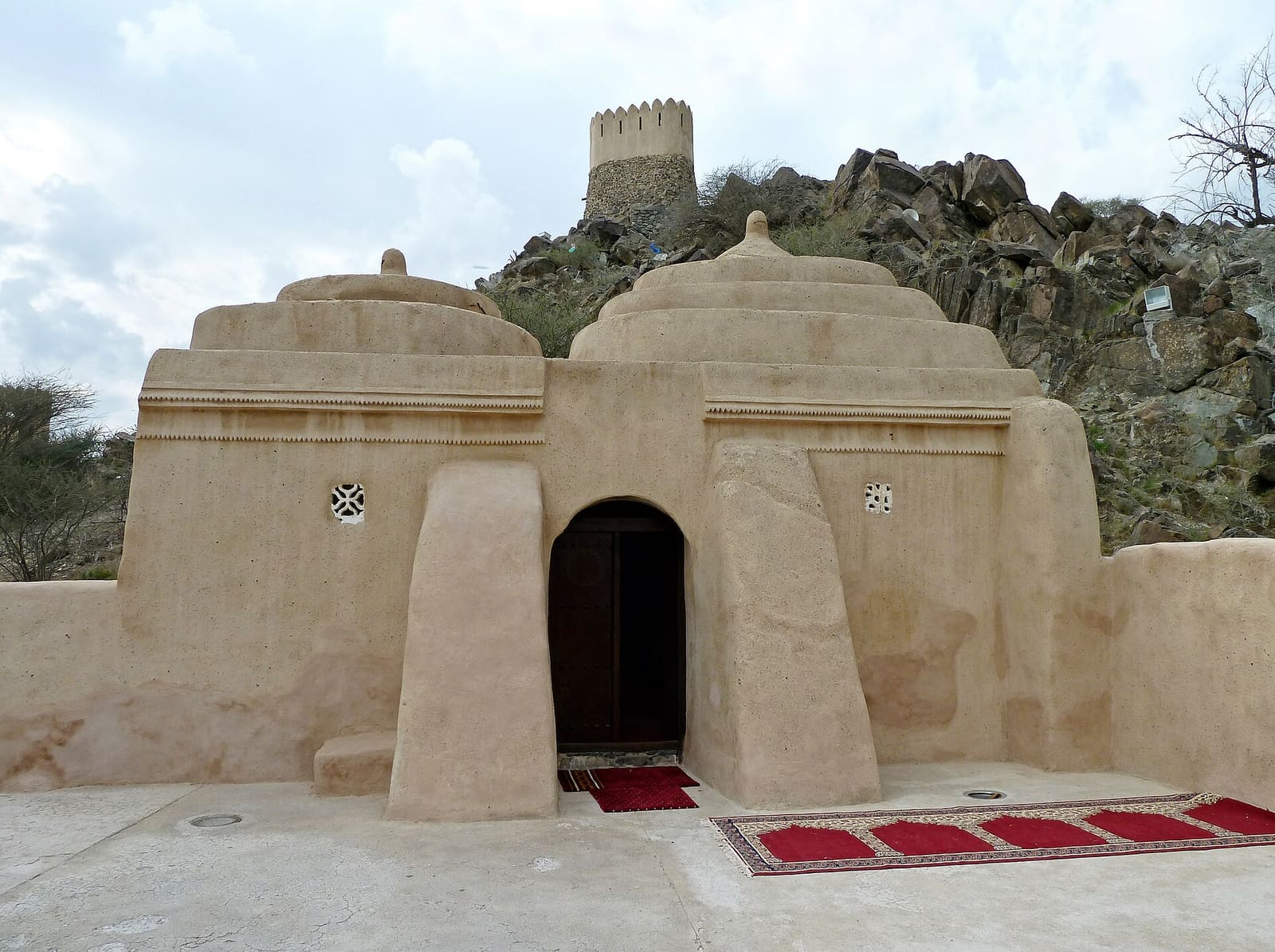 Al Bidyah Mosque below its mountain watchtower