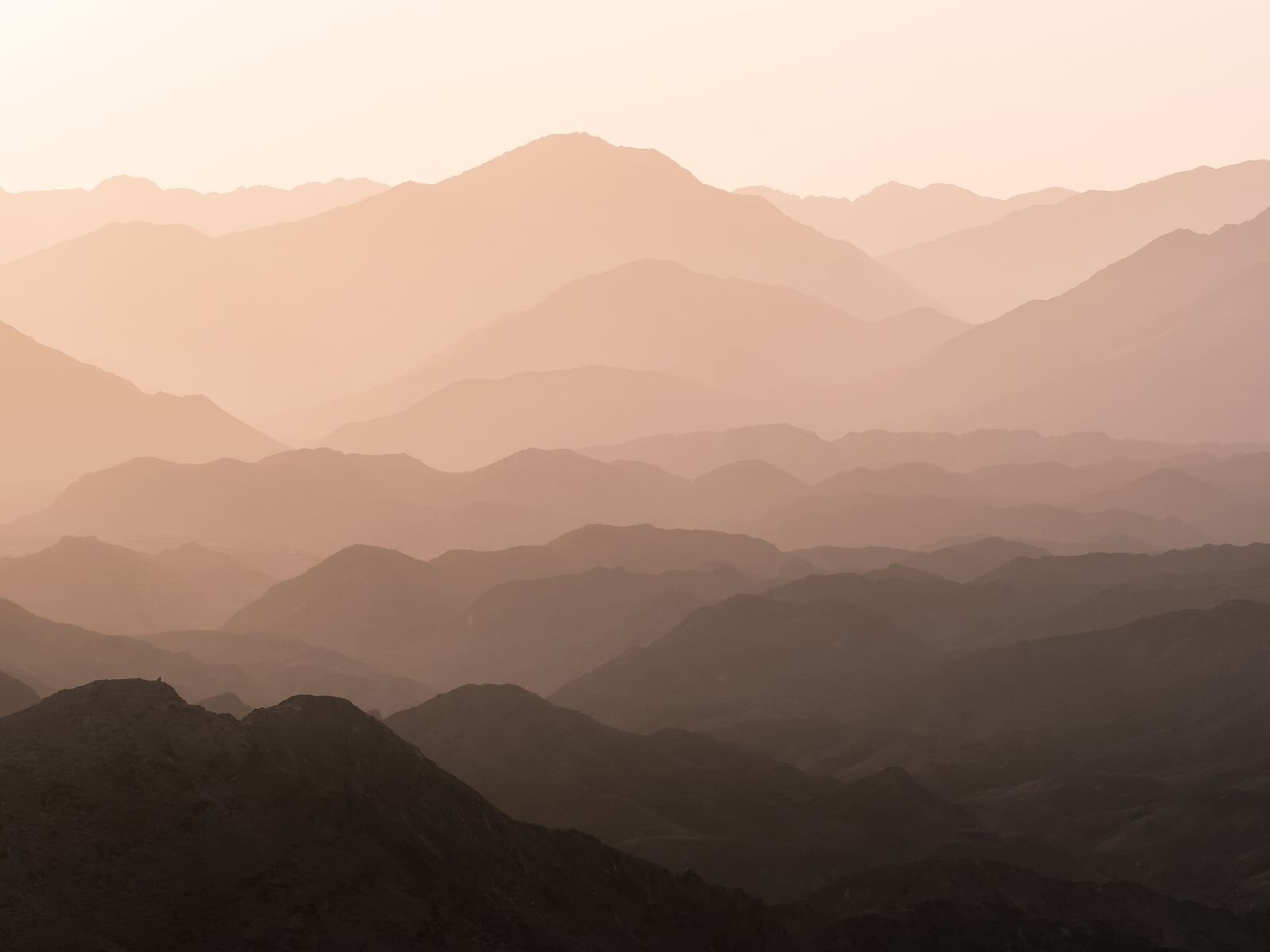Layered Hajar mountain ridges at Wadi Shawka