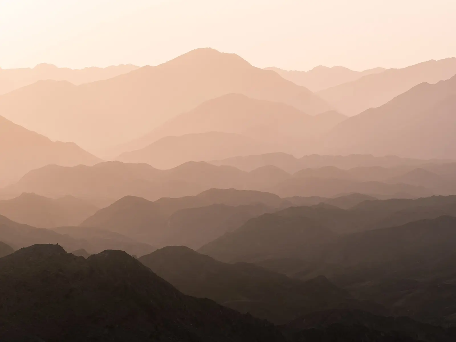 Wadi Shawka Camping: What to Know Before You Go Layered Hajar mountain ridges at Wadi Shawka